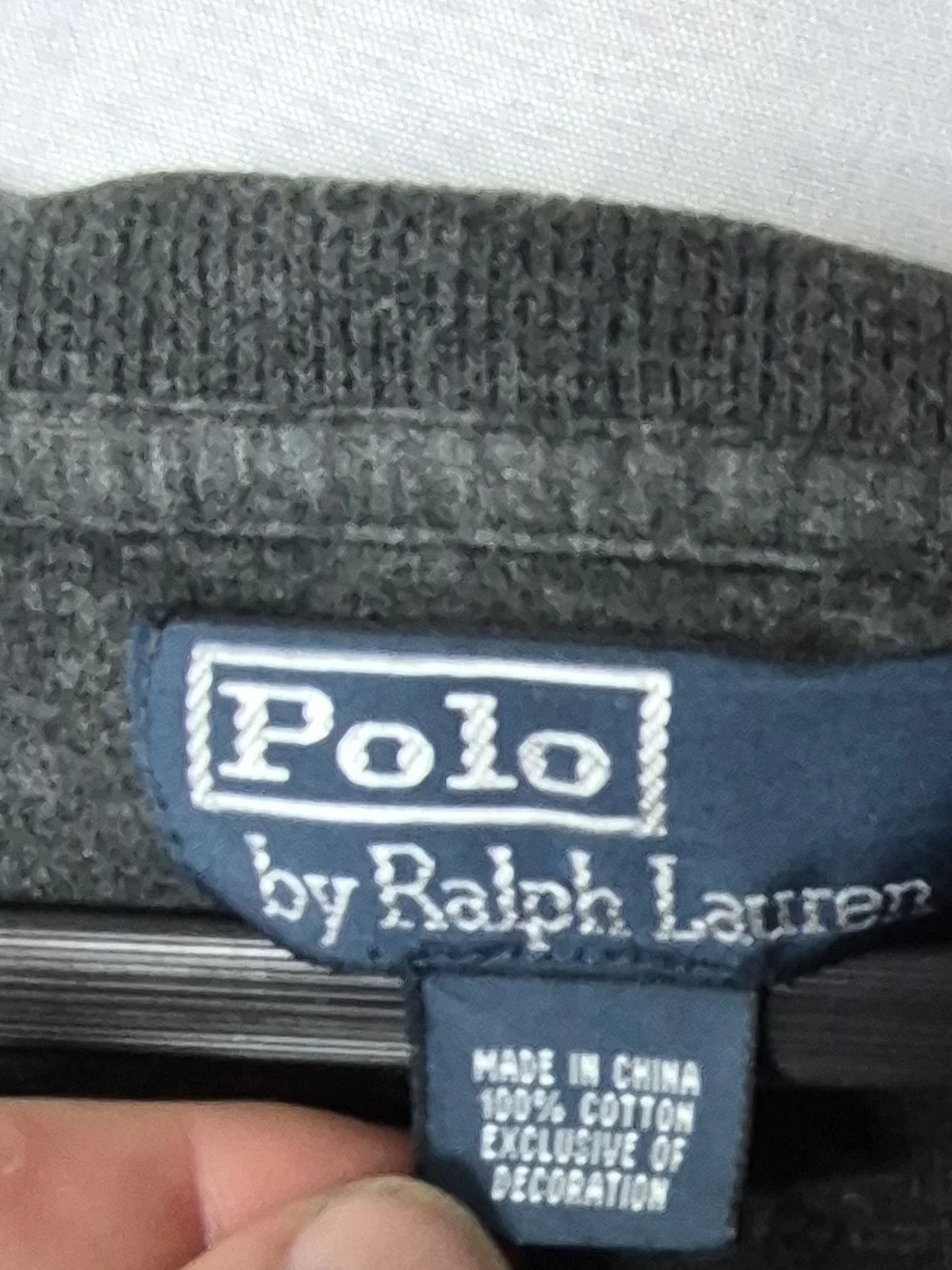Polo by Ralph Lauren quarter-zip sweater features a classic blue brand